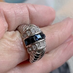 Ring with sapphire blue and clear stones
